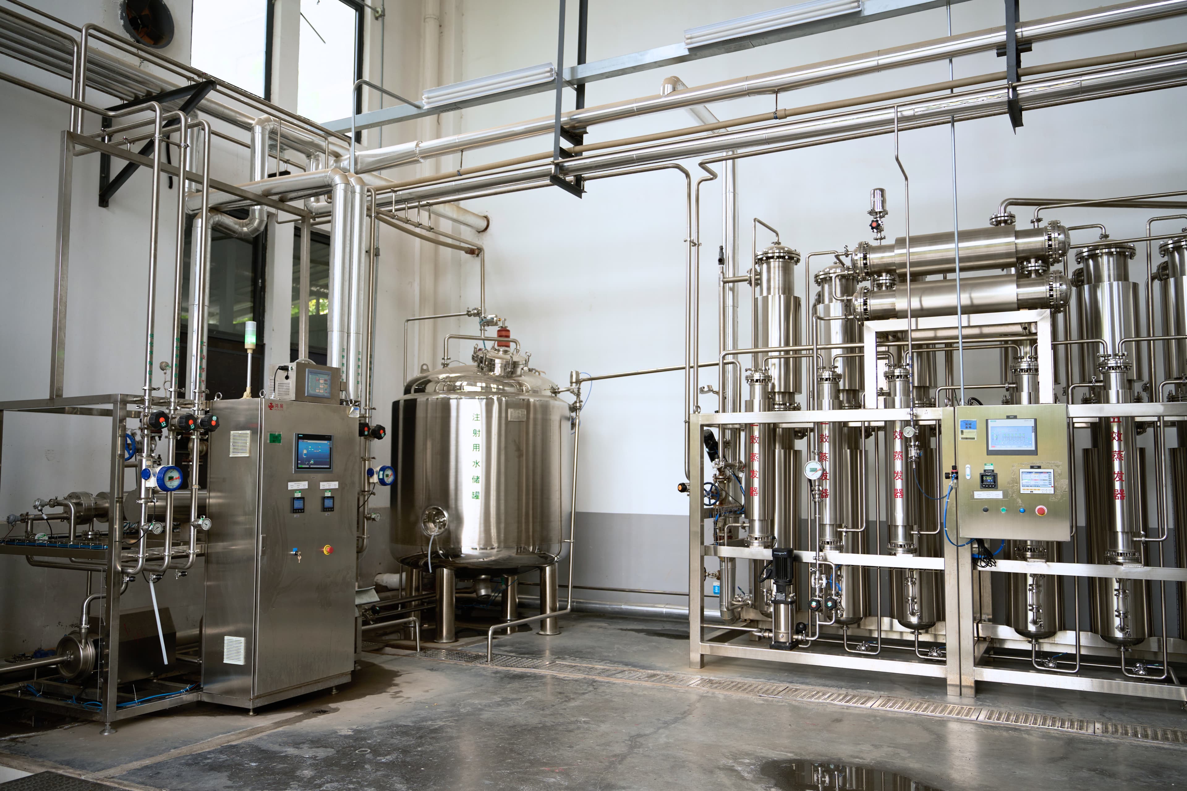 Stainless steel processing tanks, pipework, and control panels